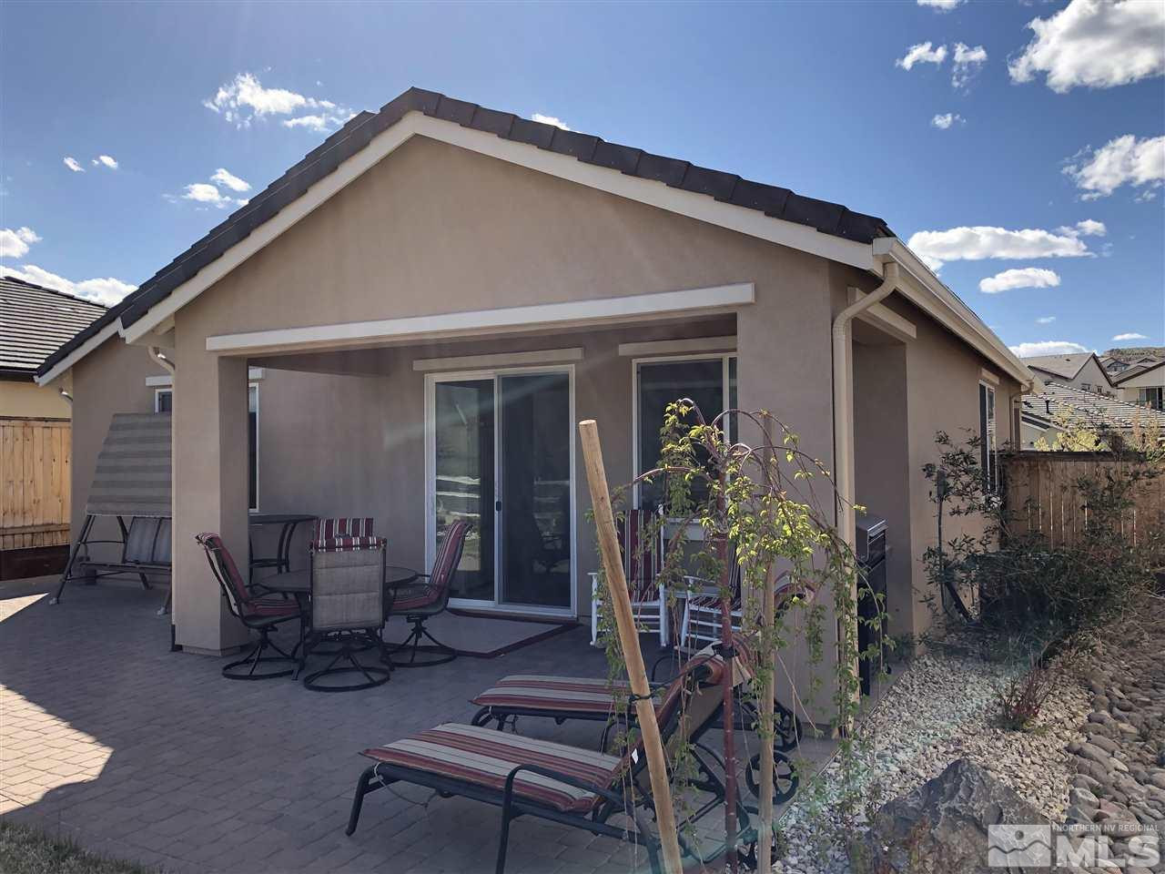 9236 Maplehurst Trail Reno, NV 89523 - Photo 2 of 25 a front view of a house with patio