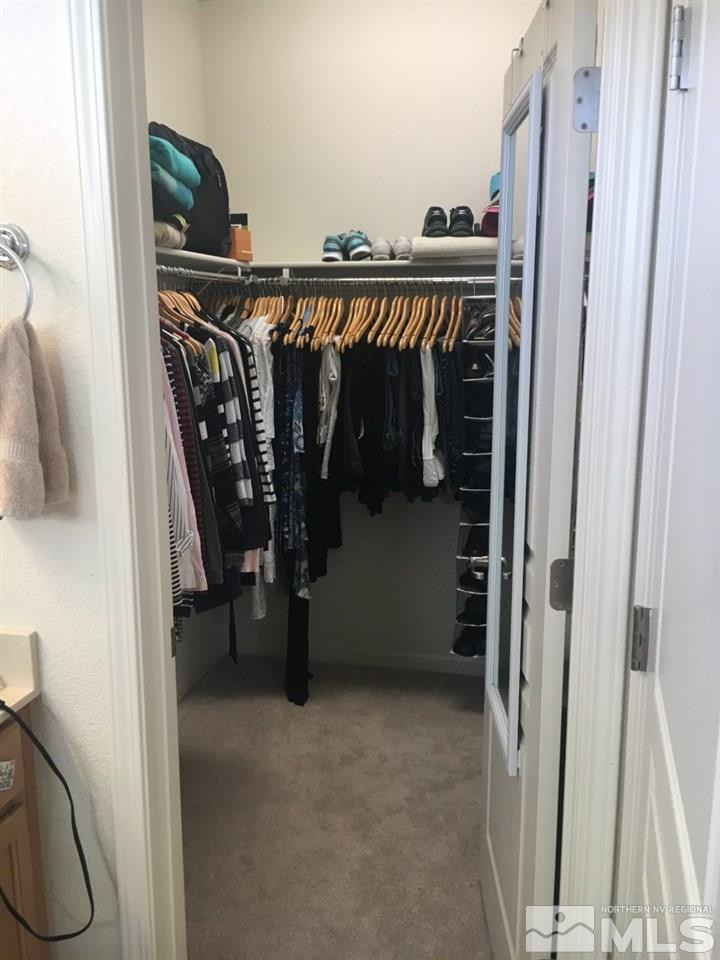 9236 Maplehurst Trail Reno, NV 89523 - Photo 23 of 25 a view of walk in closet with clothes