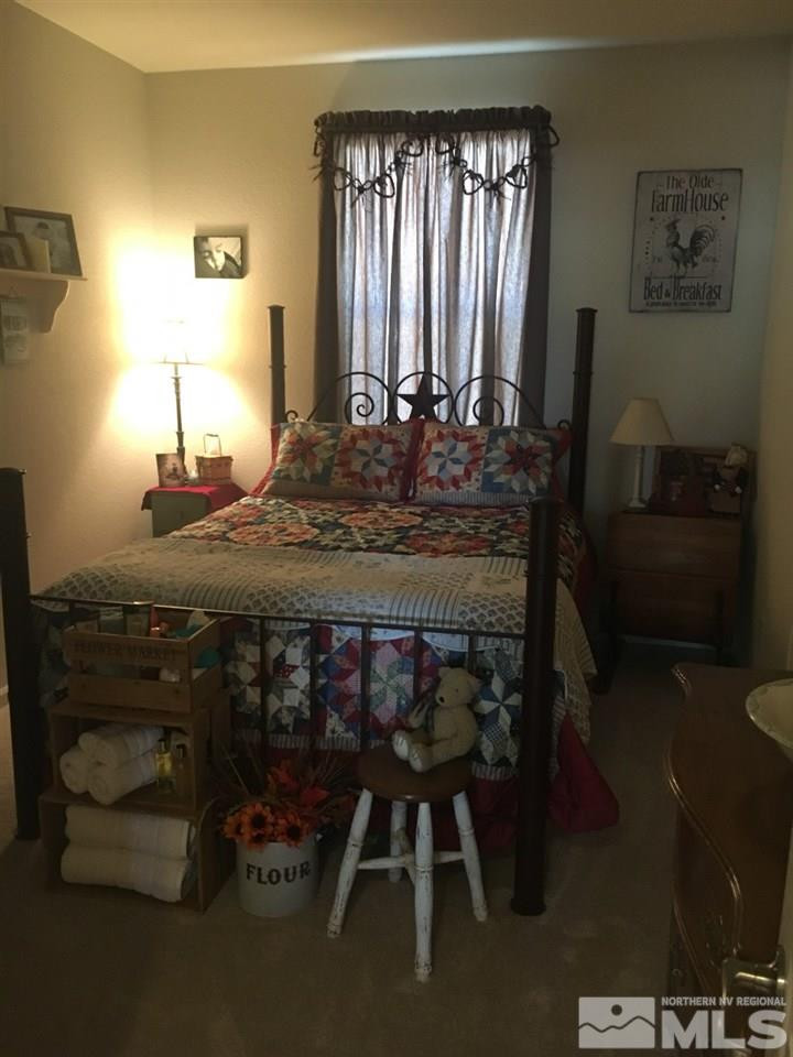9236 Maplehurst Trail Reno, NV 89523 - Photo 24 of 25 a room with a table chairs and windows
