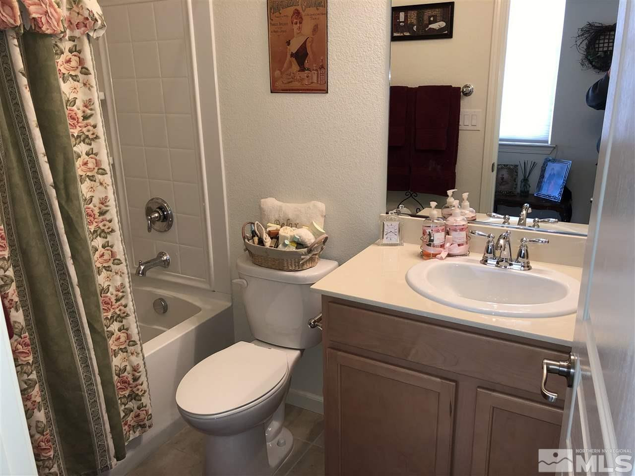 9236 Maplehurst Trail Reno, NV 89523 - Photo 25 of 25 a bathroom with a sink toilet and shower