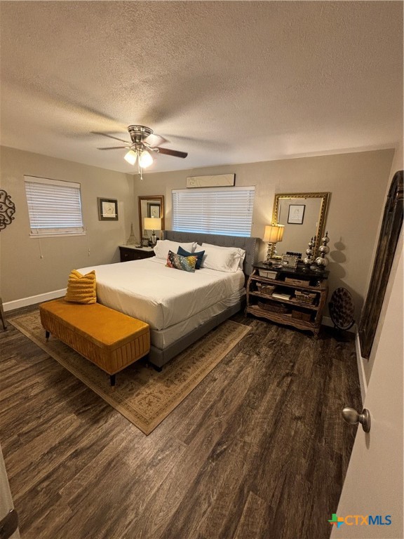 1307 Sherry Lane, Unit B Copperas Cove, TX 76522 - Photo 22 of 48 a bedroom with a bed and a ceiling fan