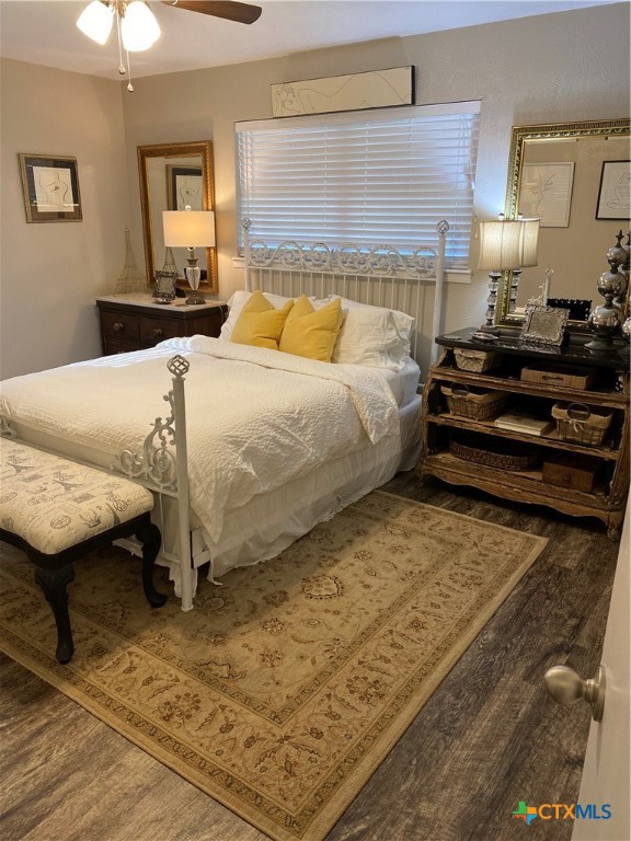 1307 Sherry Lane, Unit B Copperas Cove, TX 76522 - Photo 43 of 48 a bedroom with a bed and wooden floor