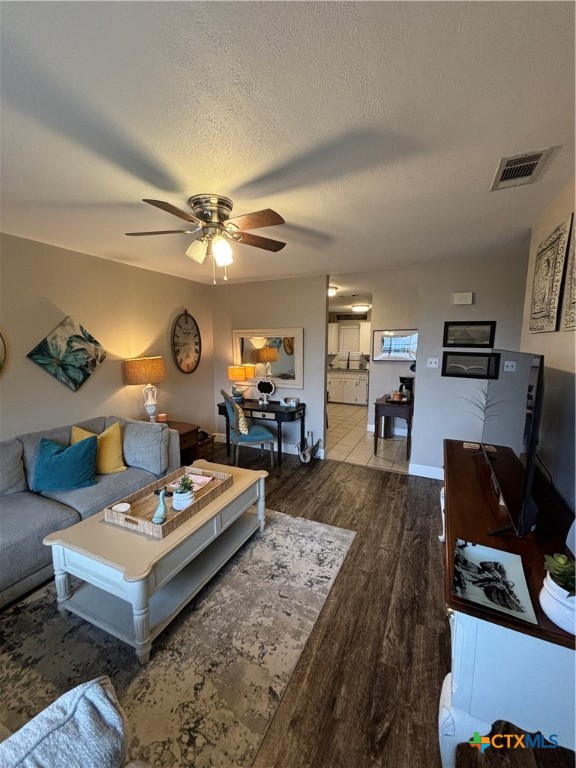 1307 Sherry Lane, Unit B Copperas Cove, TX 76522 - Photo 10 of 48 a living room with furniture and a flat screen tv