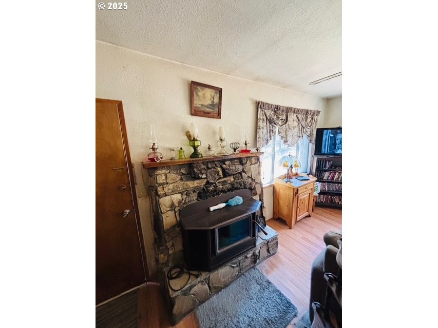 52205 Lechner Lane La Pine, OR 97739 - Photo 11 of 14 a living room with furniture and wooden floor
