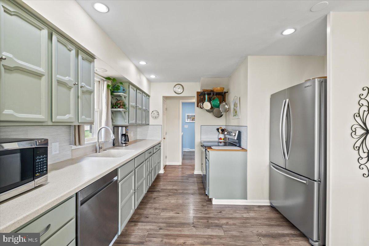 40 New Freedom Road Monroeville, NJ 08343 - Photo 11 of 51 a kitchen with stainless steel appliances a refrigerator sink and stove