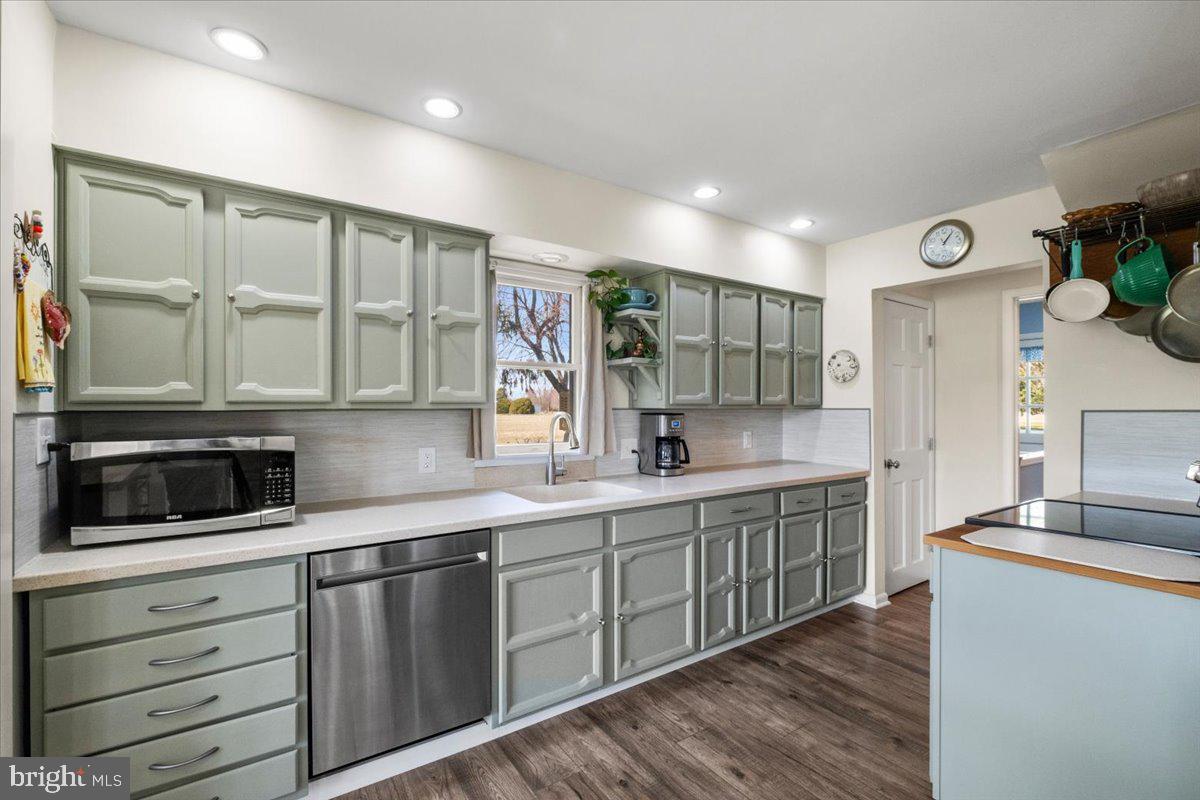 40 New Freedom Road Monroeville, NJ 08343 - Photo 12 of 51 a kitchen with stainless steel appliances granite countertop a sink and wooden cabinets