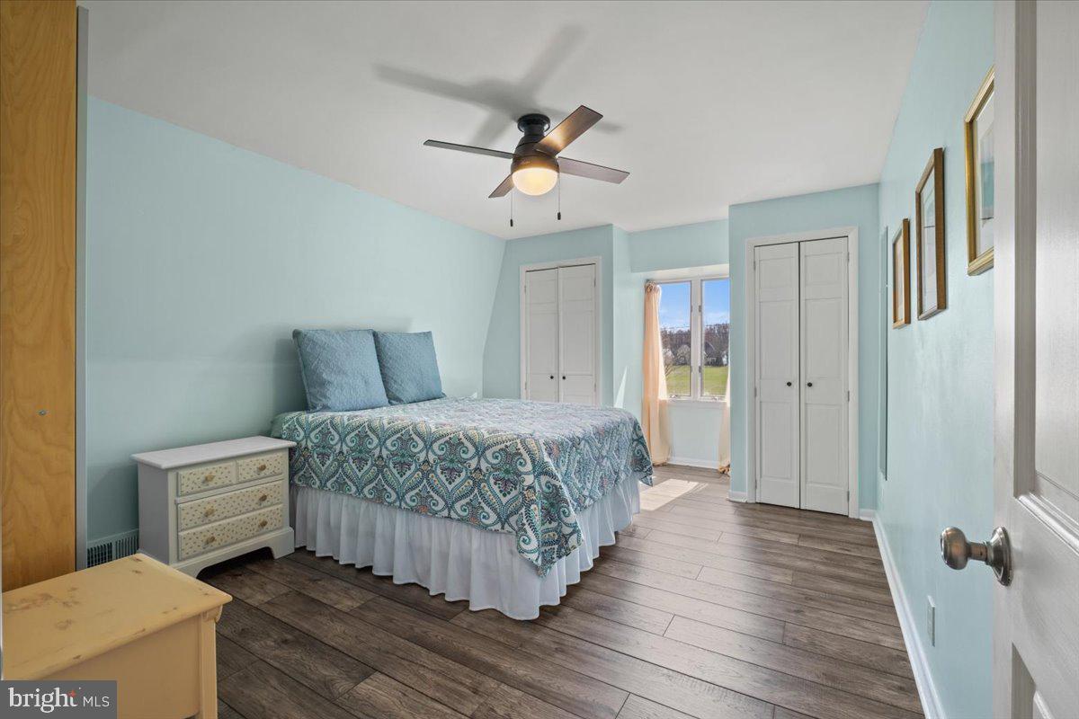 40 New Freedom Road Monroeville, NJ 08343 - Photo 25 of 51 a bedroom with a bed and a chandelier