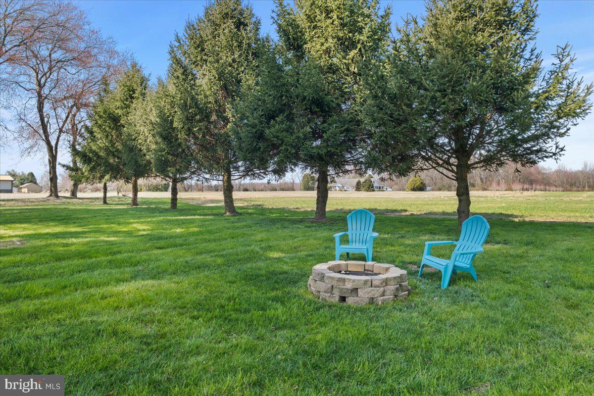 40 New Freedom Road Monroeville, NJ 08343 - Photo 46 of 51 a view of a garden with a bench
