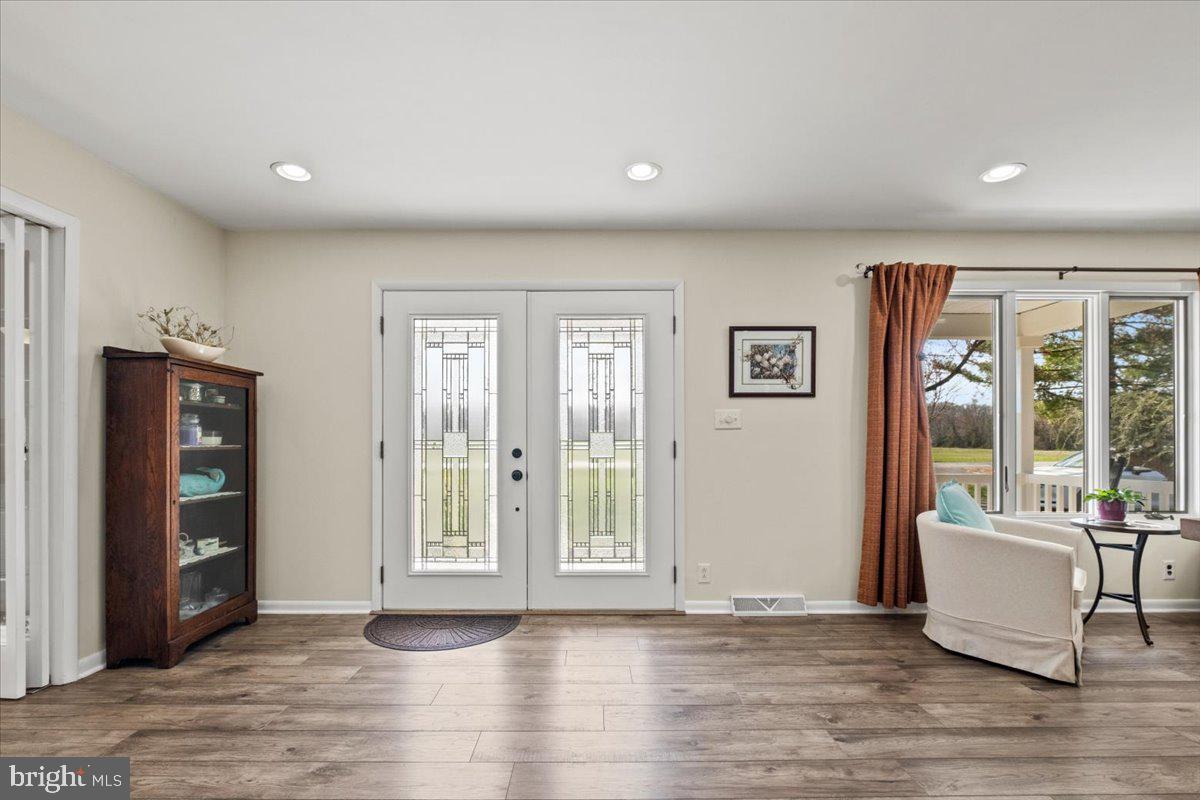 40 New Freedom Road Monroeville, NJ 08343 - Photo 5 of 51 a view of an empty room with wooden floor and a window