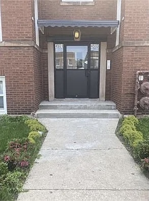 4501 West Maypole Avenue Chicago, IL 60624 - Photo 2 of 13 a front view of a house