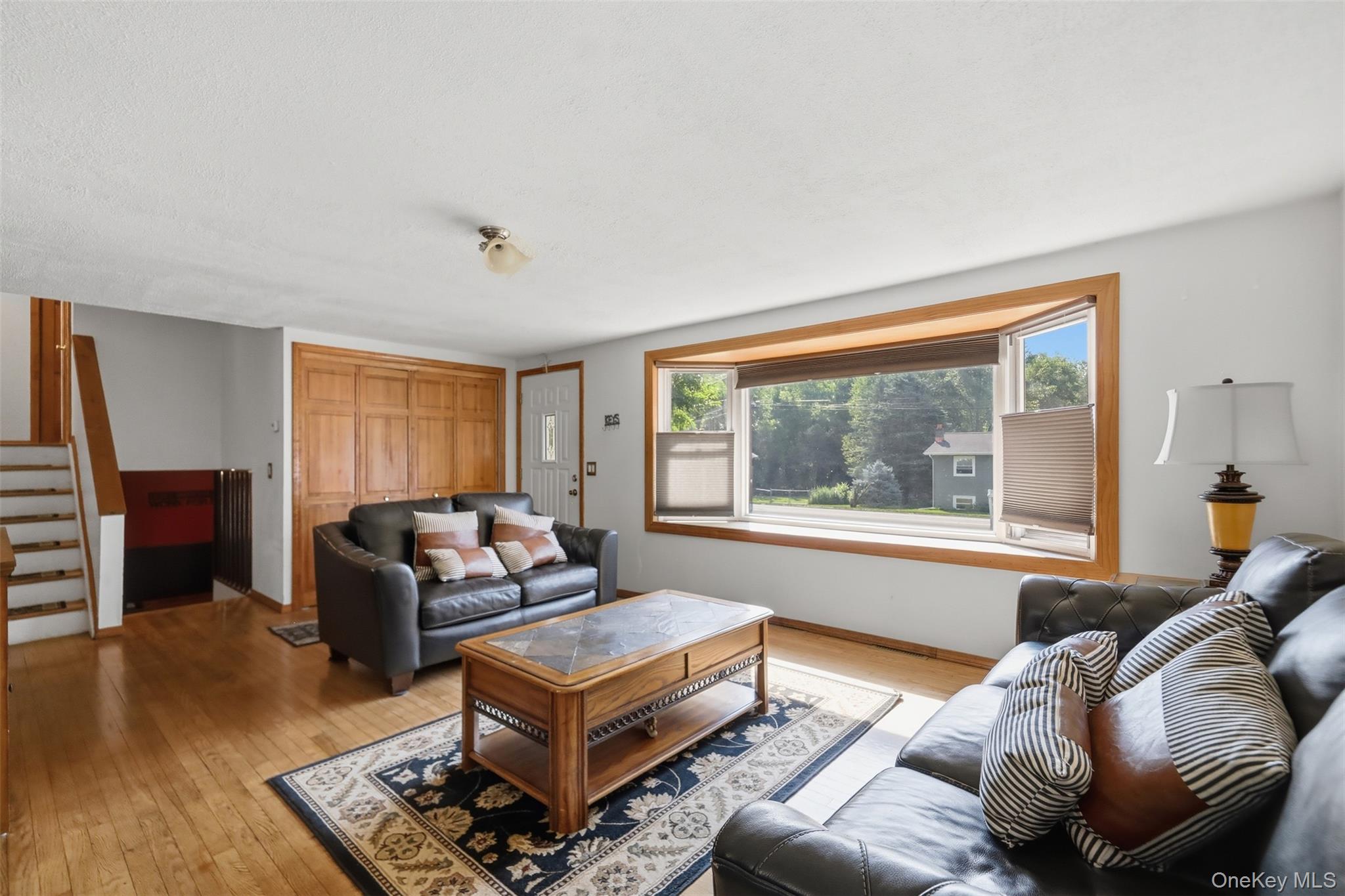 74 Creek Run Road Newburgh, NY 12550 - Photo 3 of 26 Living room layout, hardwood flooring as seen.