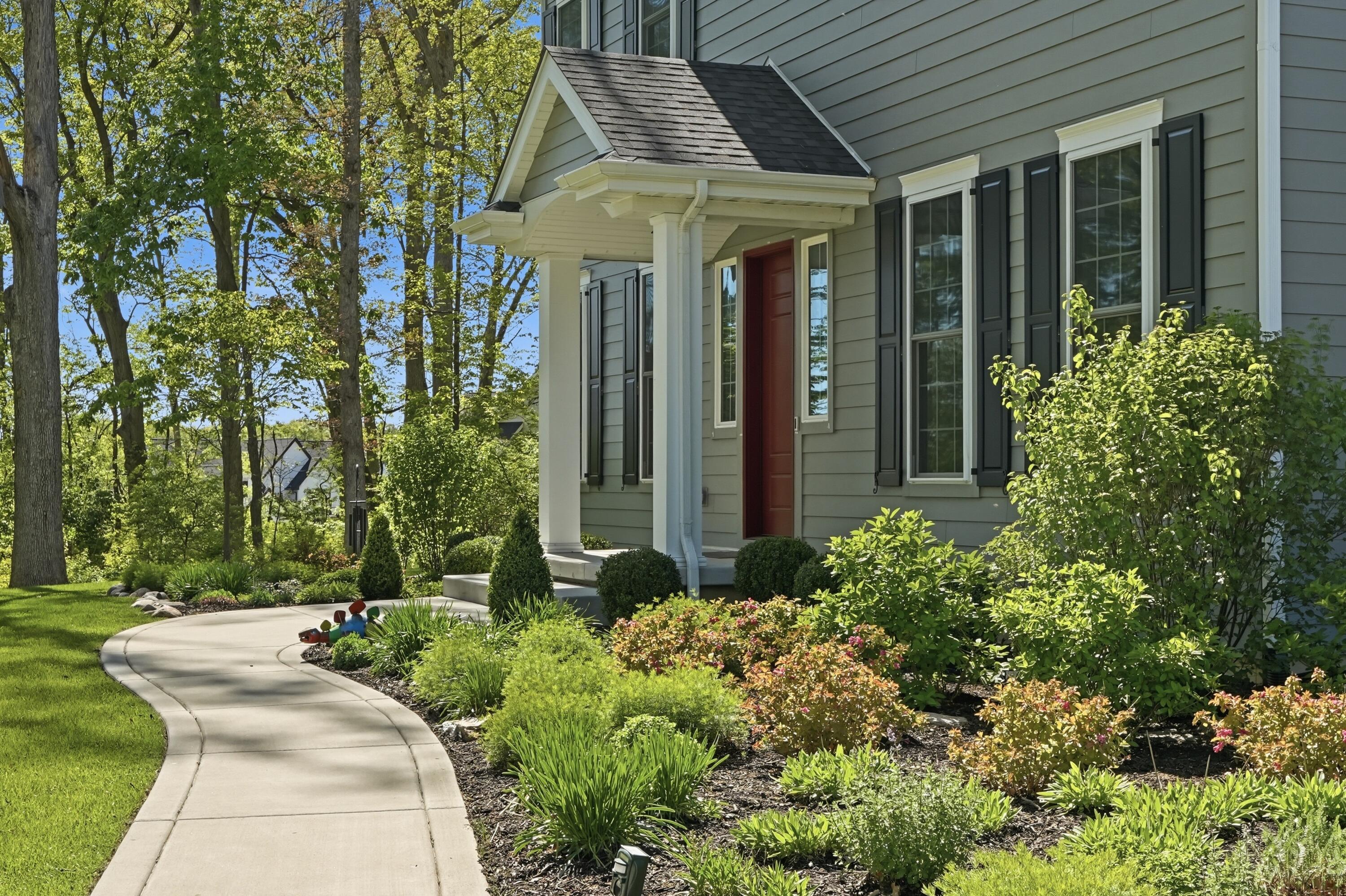 804 Shannon Drive Crown Point, IN 46307 - Photo 11 of 79 a front view of a house with garden