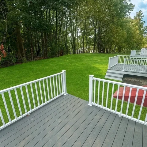 a view of deck with a wooden fence