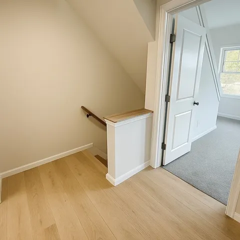 an empty room with a mirror