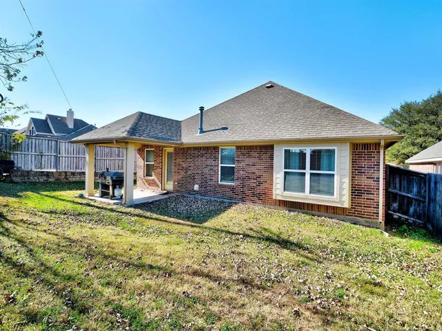 a view of outdoor space and barbecue grill