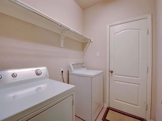 a view of a chandelier and window in a room