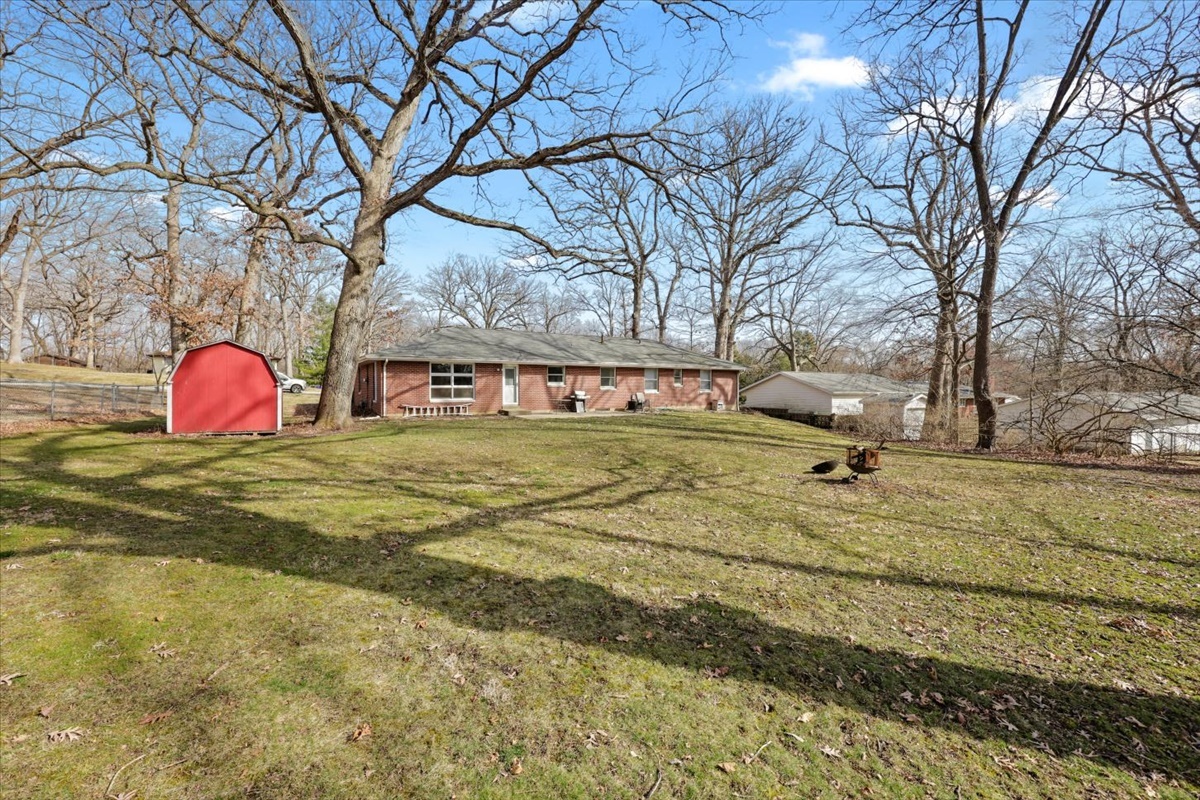 3323 Dell Oak Drive Decatur, IL 62526 - Photo 29 of 32 a view of a yard with large trees