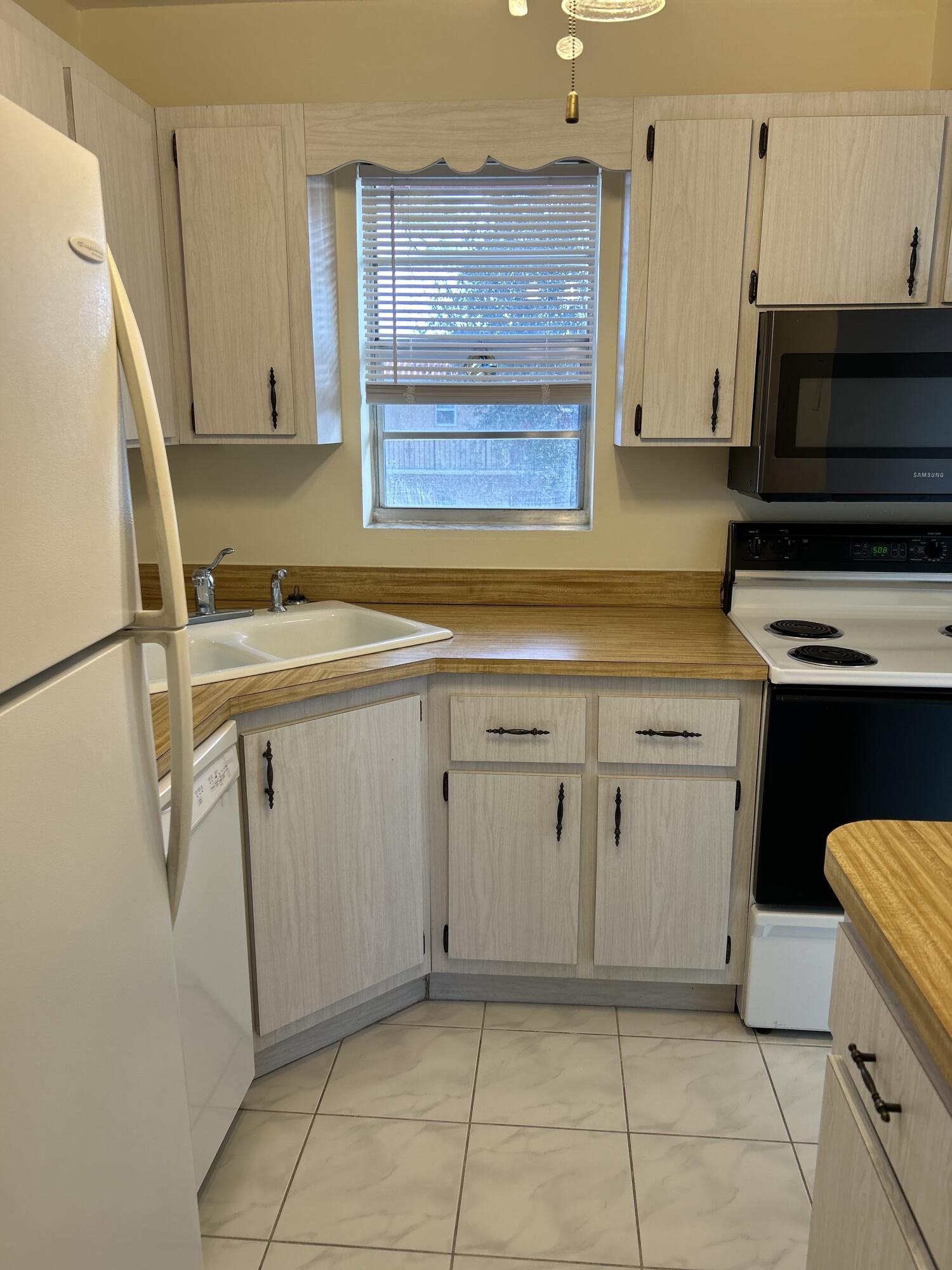 1923 Southwest Palm City Road, Unit G Stuart, FL 34994 - Photo 13 of 26 Kitchen