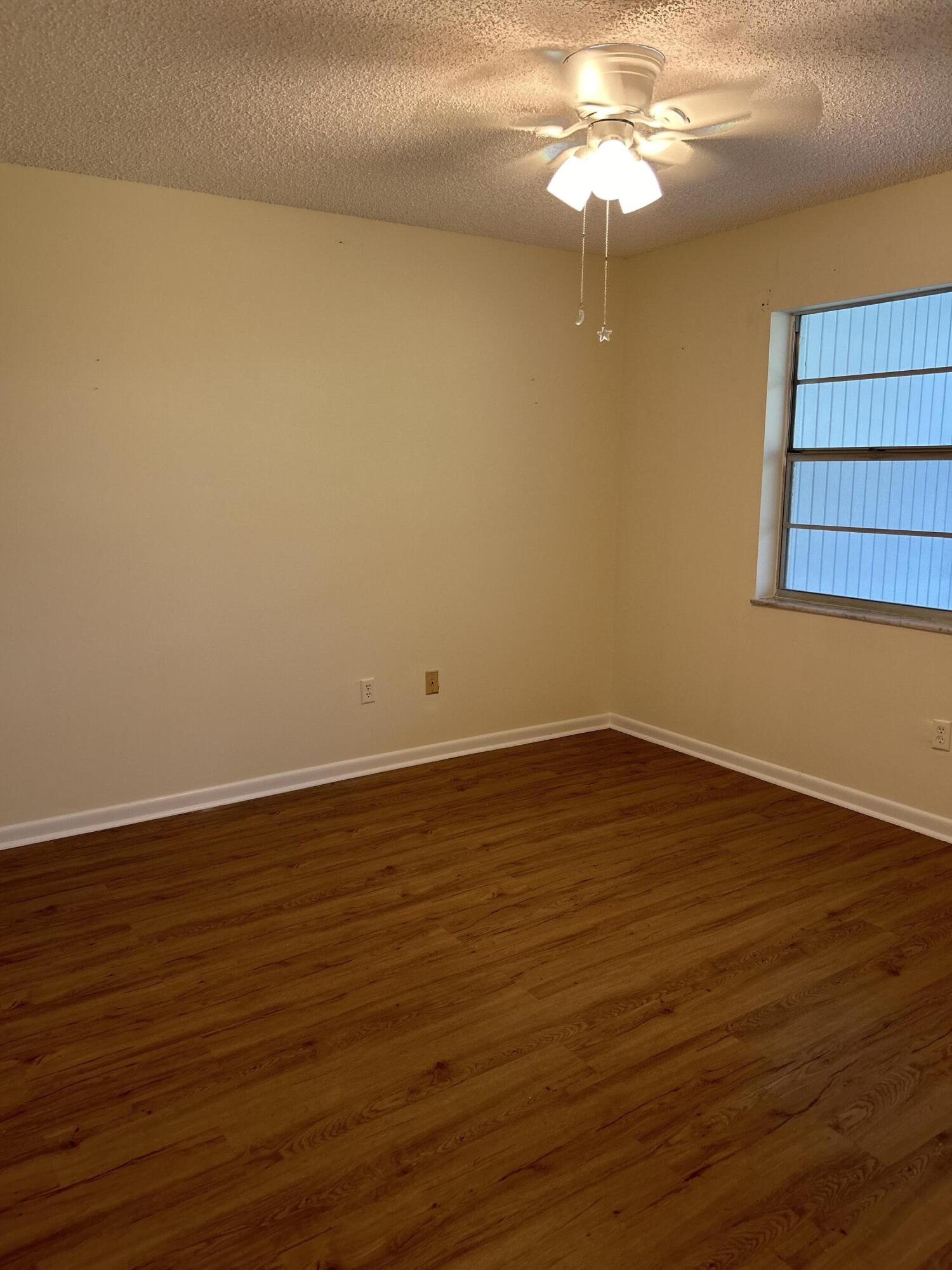 1923 Southwest Palm City Road, Unit G Stuart, FL 34994 - Photo 17 of 26 Primary Bedroom