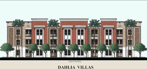 a front view of building with a lot of windows