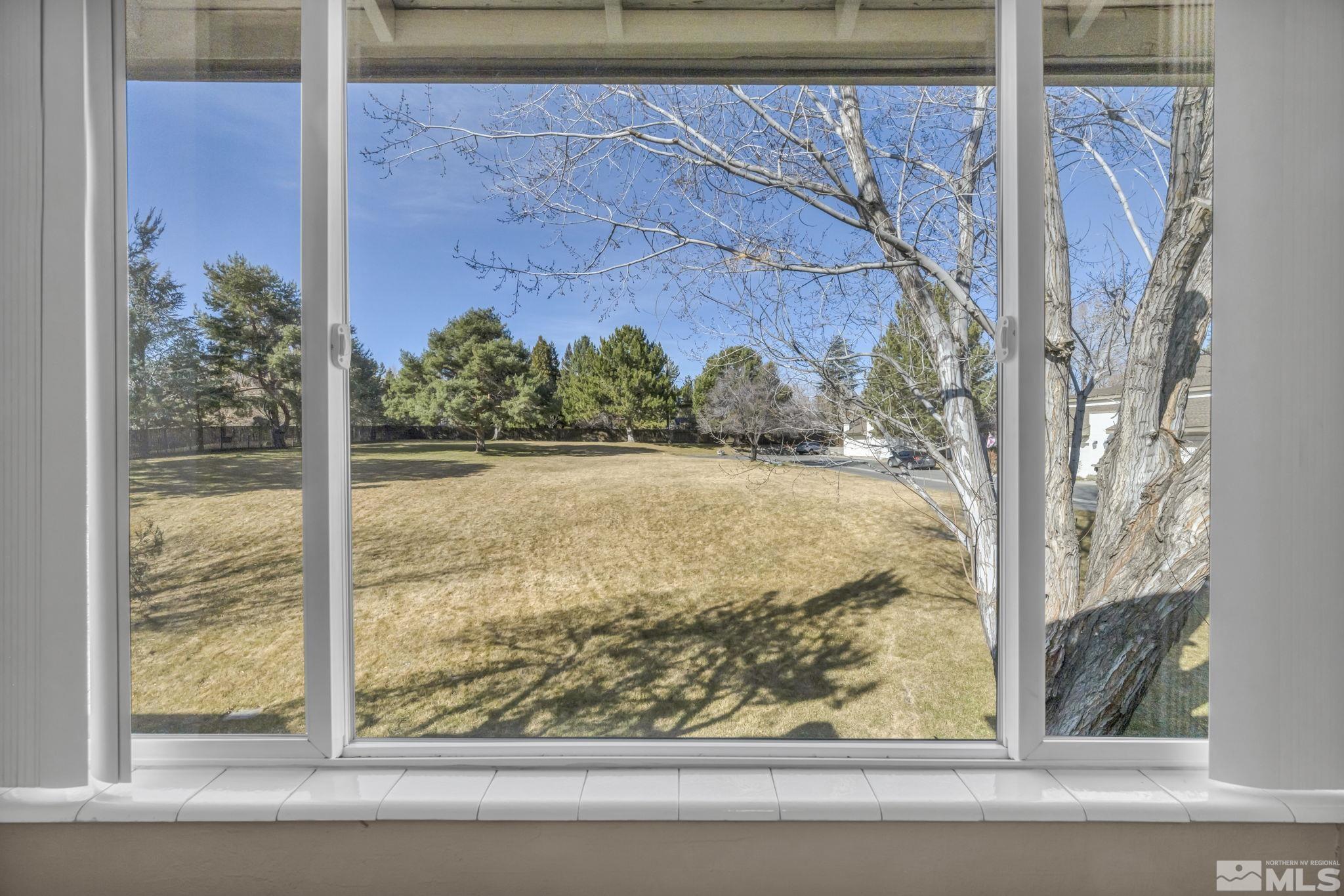 4311 Clyde Court Reno, NV 89509 - Photo 21 of 40 a view of a room with a window and front door
