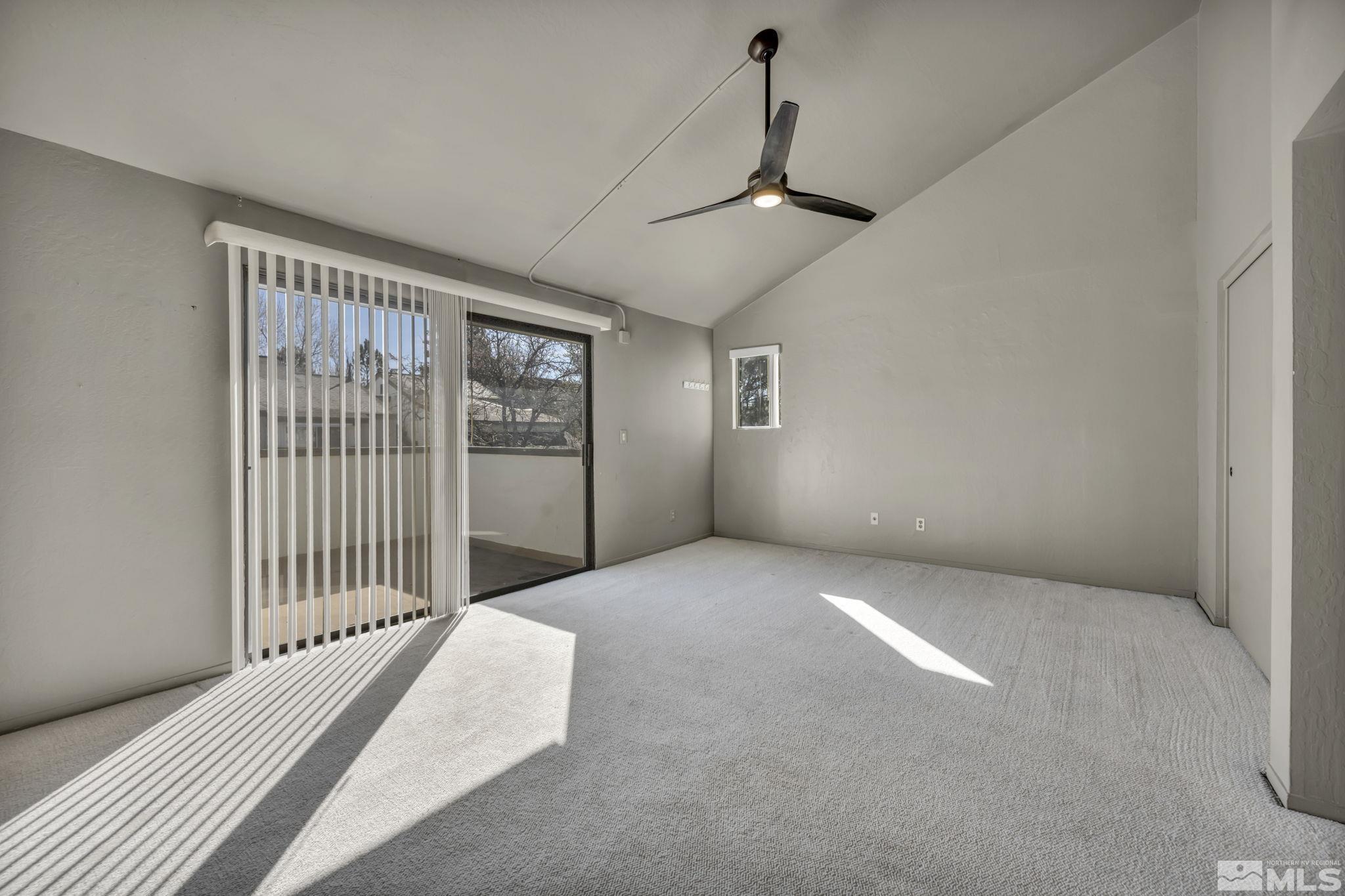 4311 Clyde Court Reno, NV 89509 - Photo 28 of 40 a view of a hallway with a bedroom