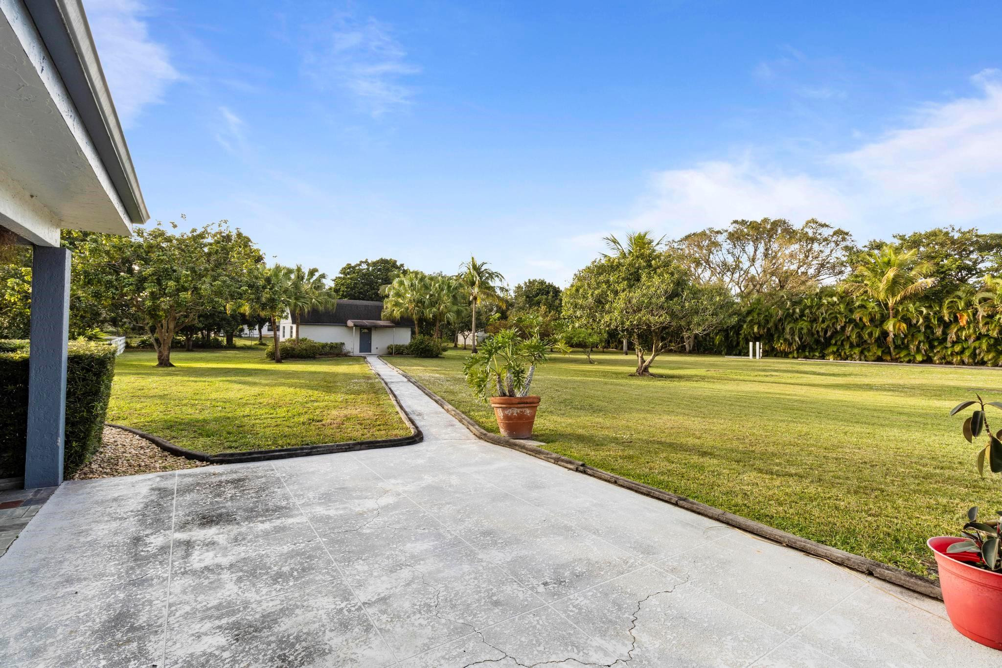 17781 Southwest 52nd Court Southwest Ranches, FL 33331 - Photo 15 of 39 a view of a swimming pool with an ocean view