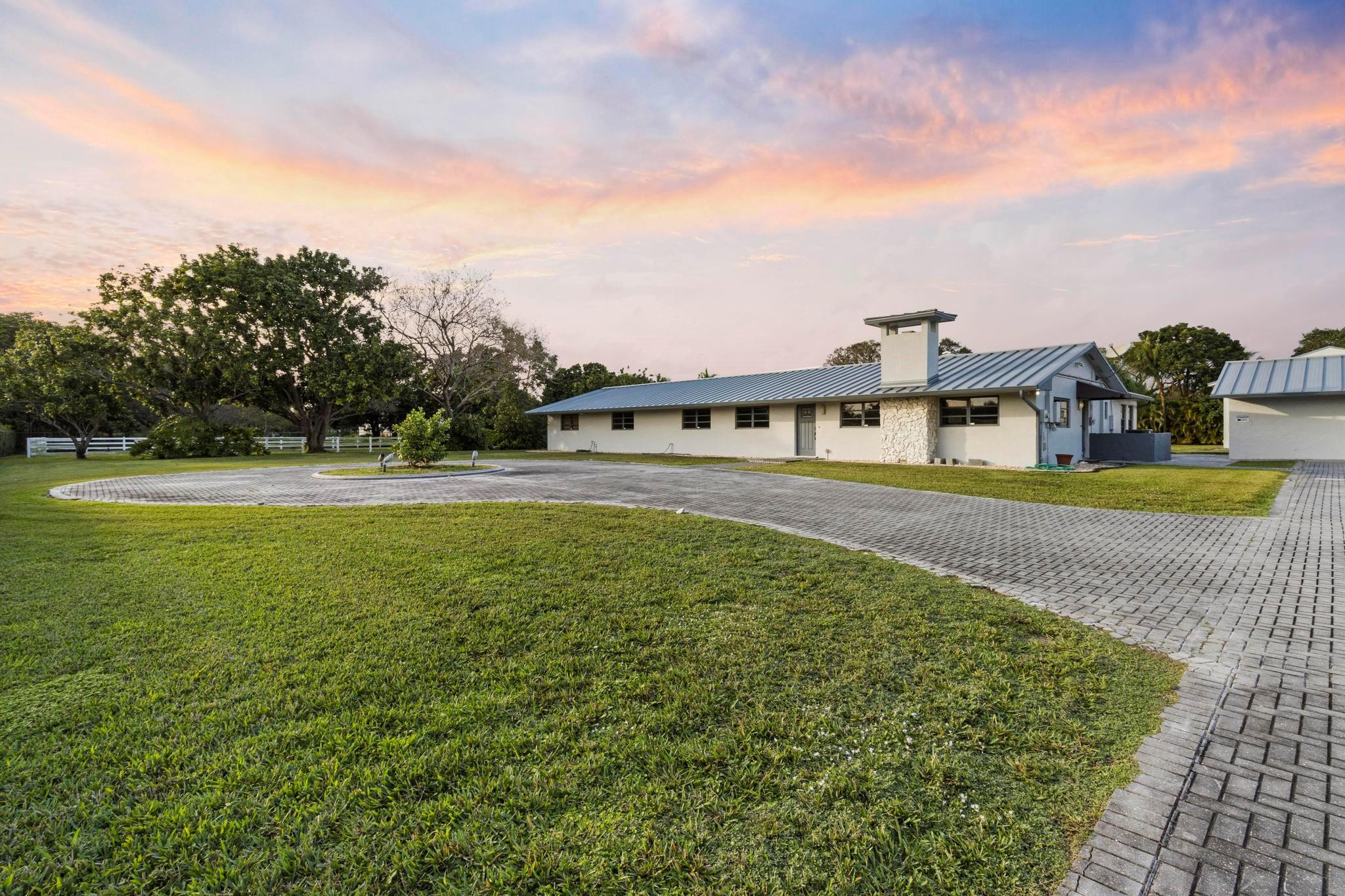 17781 Southwest 52nd Court Southwest Ranches, FL 33331 - Photo 17 of 39 a view of a swimming pool with an outdoor seating