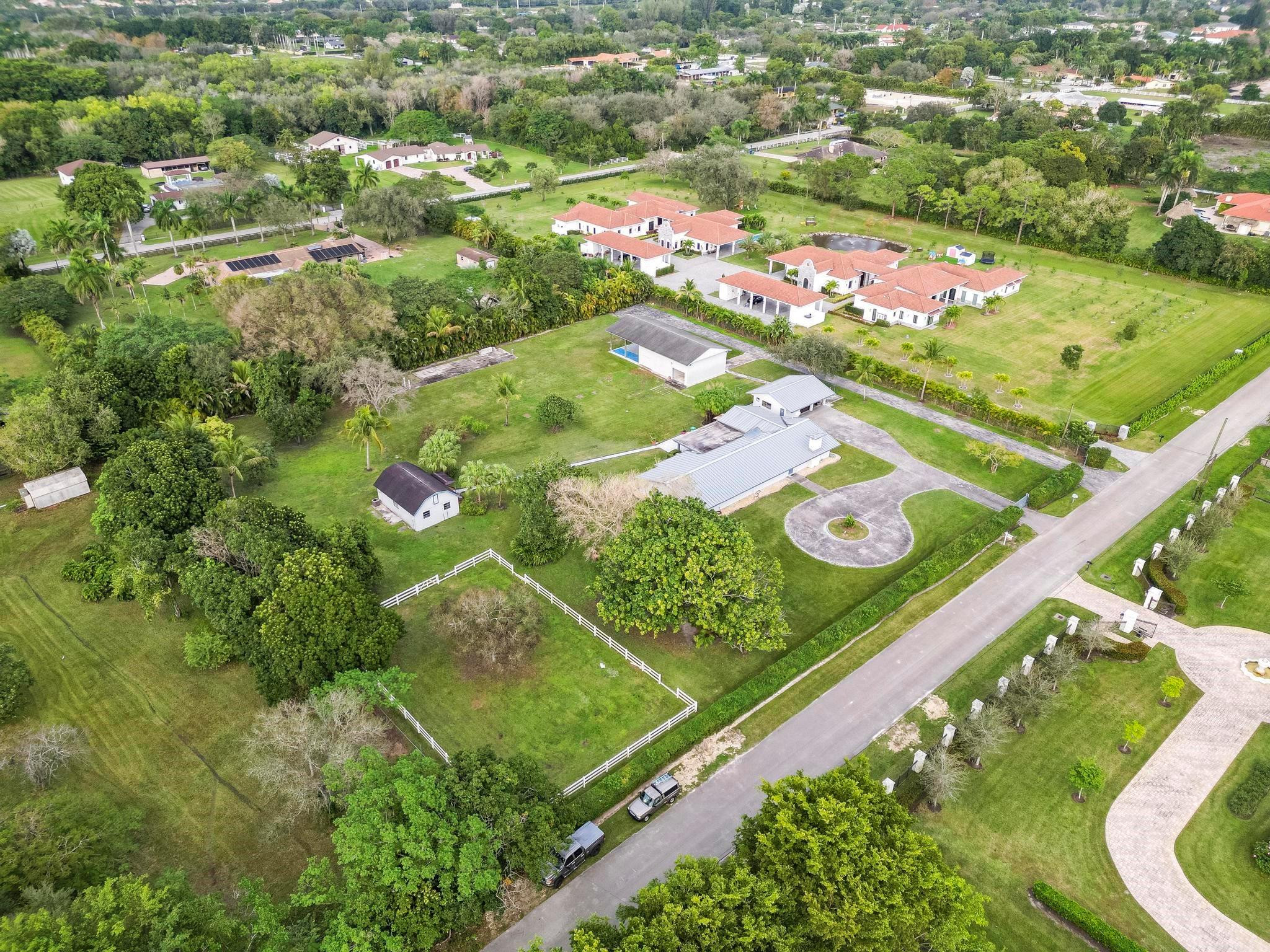 17781 Southwest 52nd Court Southwest Ranches, FL 33331 - Photo 23 of 39 an aerial view of residential houses with outdoor space and street view