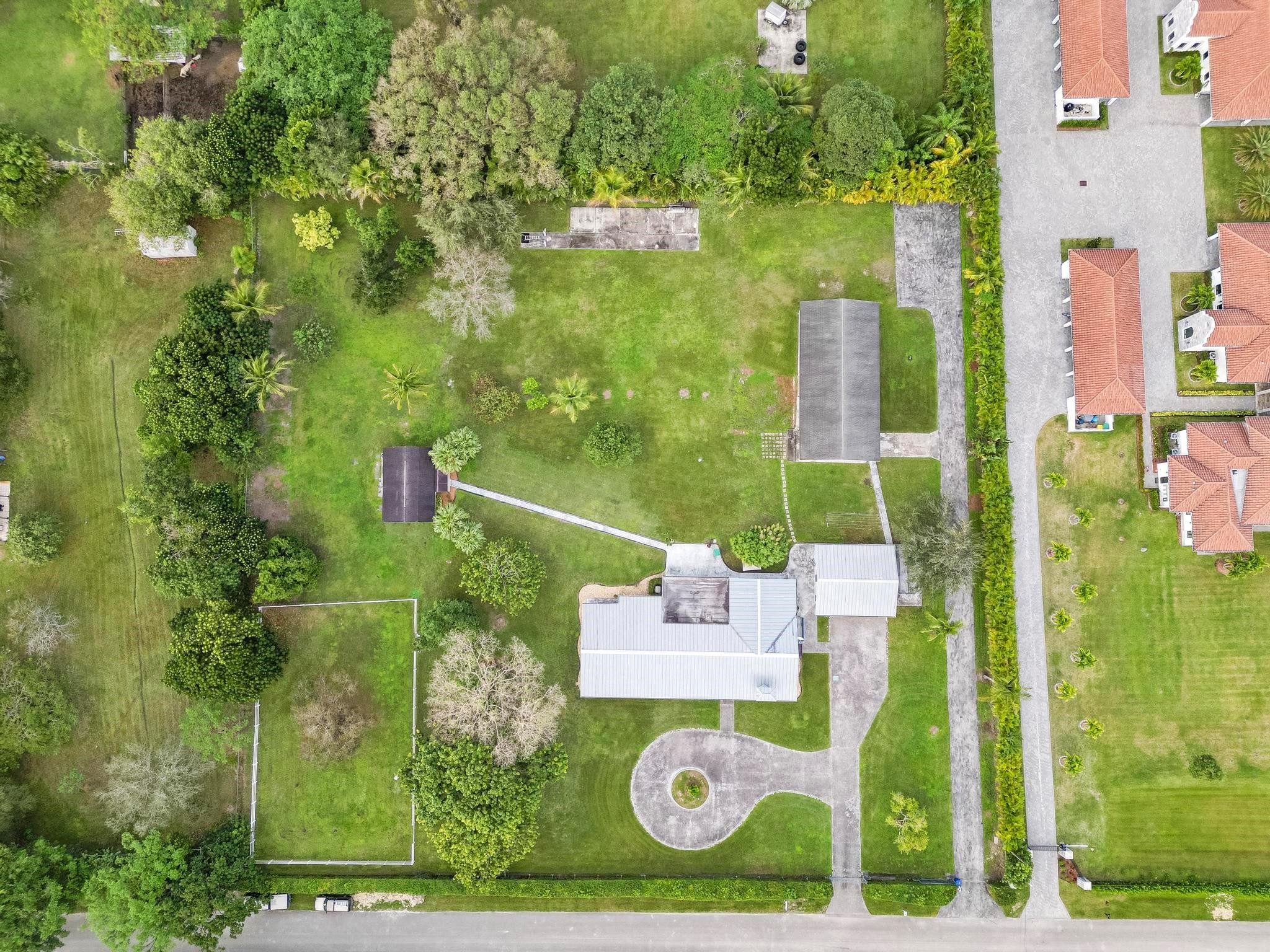 17781 Southwest 52nd Court Southwest Ranches, FL 33331 - Photo 24 of 39 an aerial view of residential house with outdoor space and trees