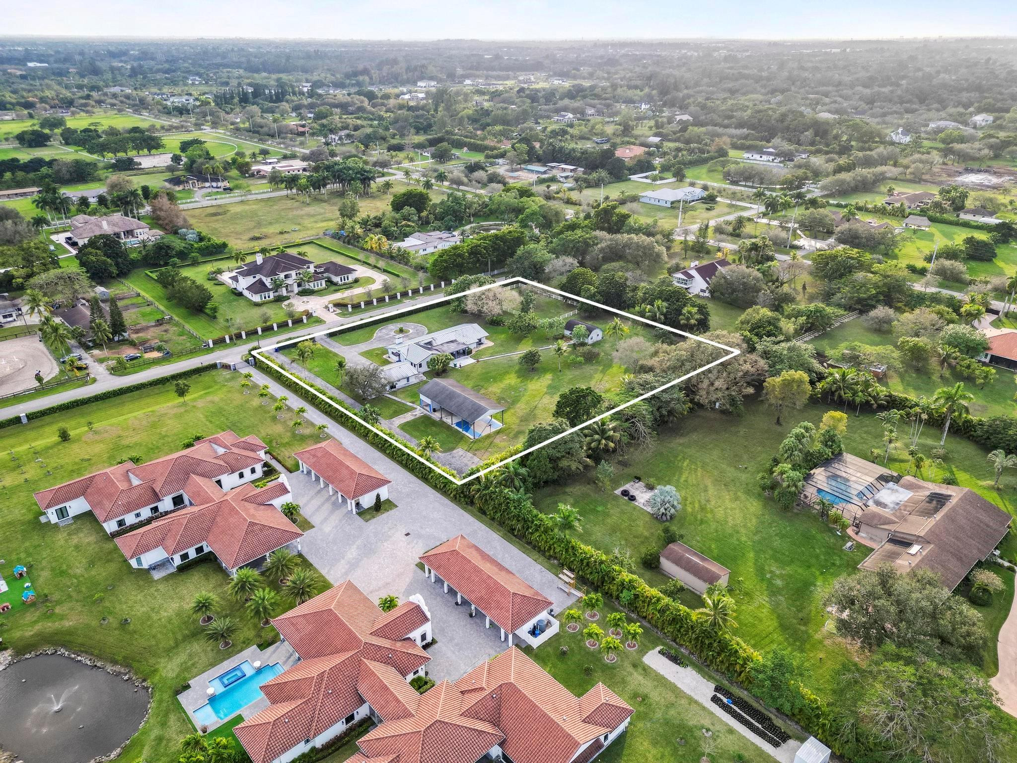 17781 Southwest 52nd Court Southwest Ranches, FL 33331 - Photo 25 of 39 an aerial view of residential houses with outdoor space