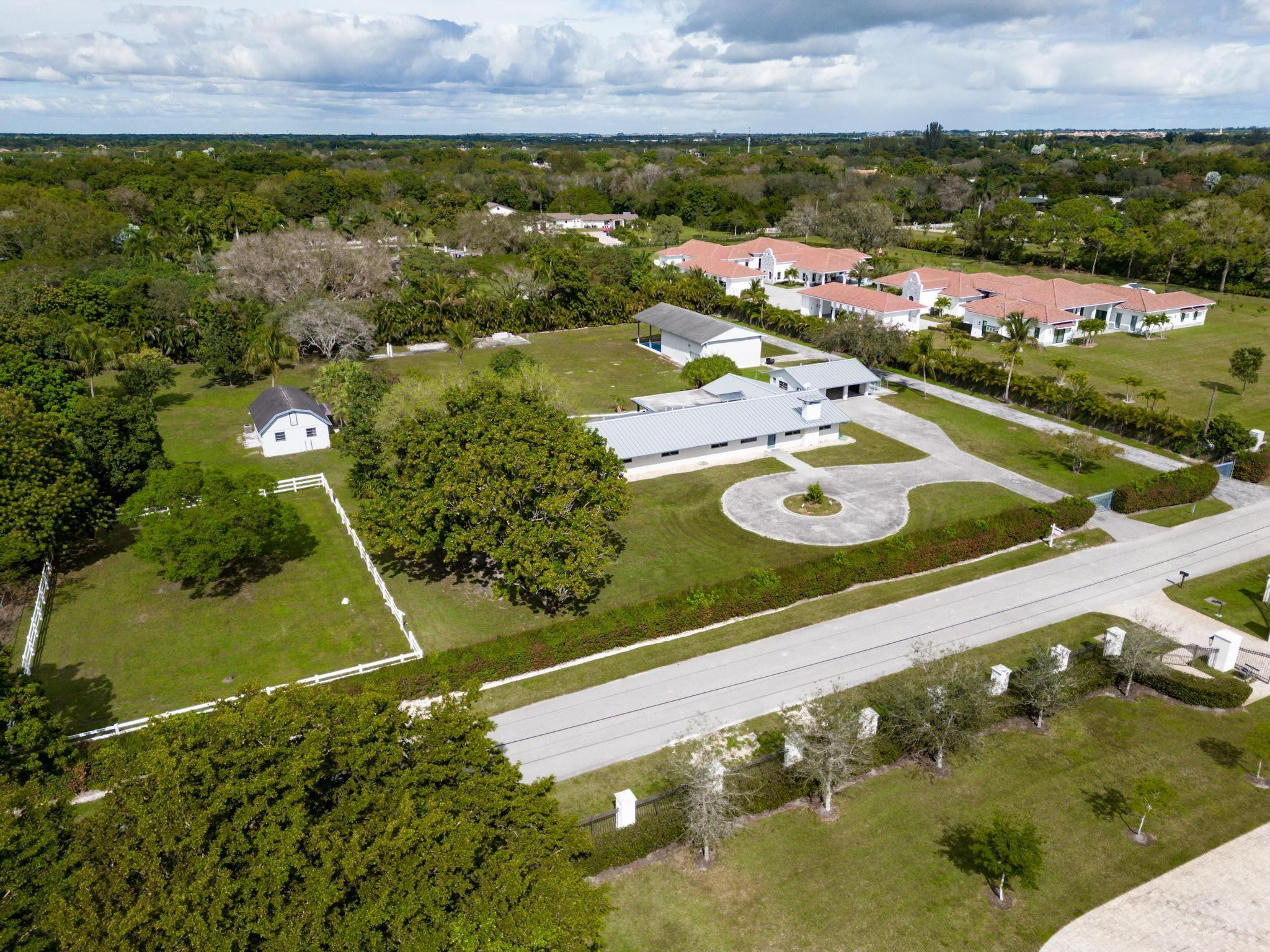 17781 Southwest 52nd Court Southwest Ranches, FL 33331 - Photo 28 of 39 an aerial view of a house