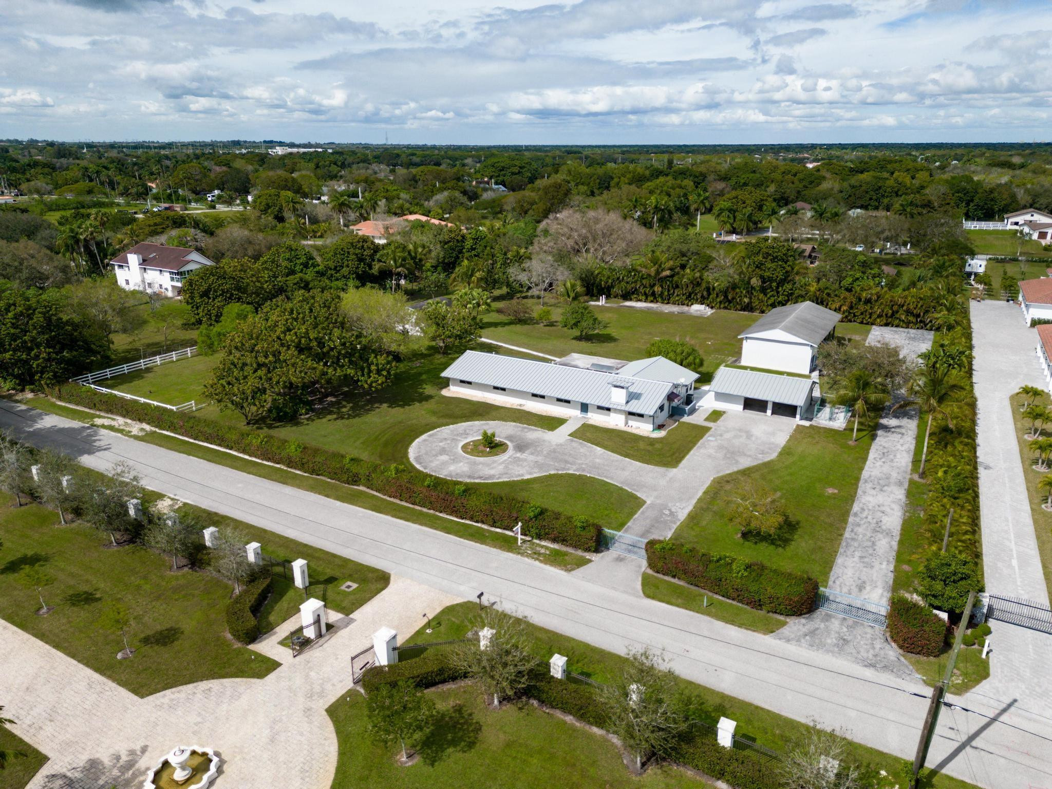 17781 Southwest 52nd Court Southwest Ranches, FL 33331 - Photo 30 of 39 a view of yard from deck with patio