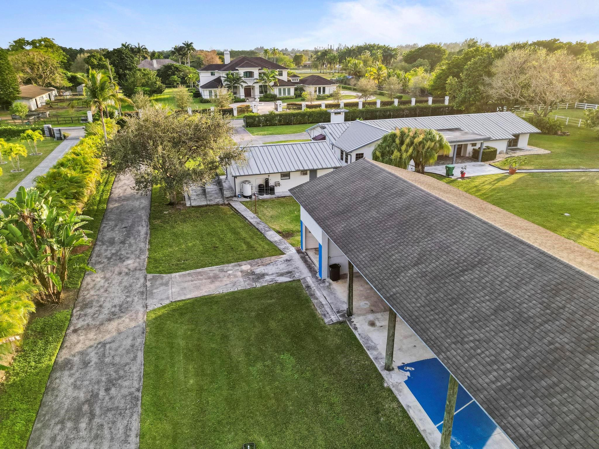 17781 Southwest 52nd Court Southwest Ranches, FL 33331 - Photo 9 of 39 a view of a city from a terrace