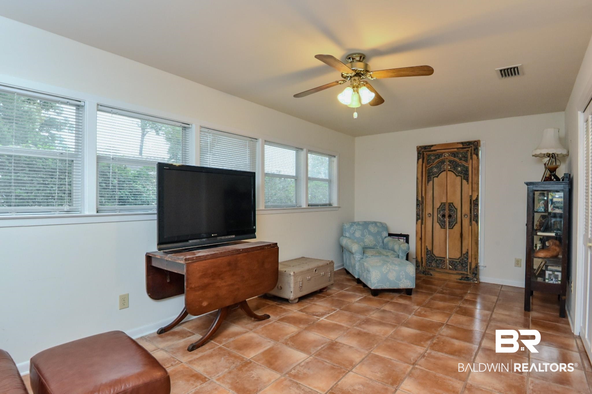 90 Paddock Drive Fairhope, AL 36532 - Photo 21 of 23 Living area featuring a ceiling fan and tile patterned floors