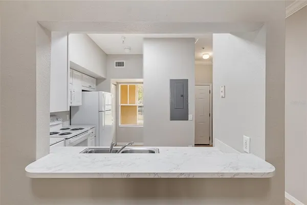 a bathroom with bathtub and window