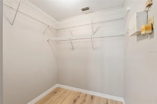 a view of a room with racks on the wall