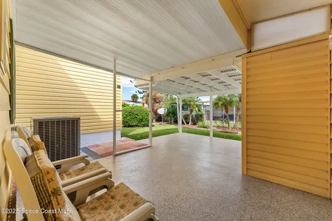 a view of backyard with seating space