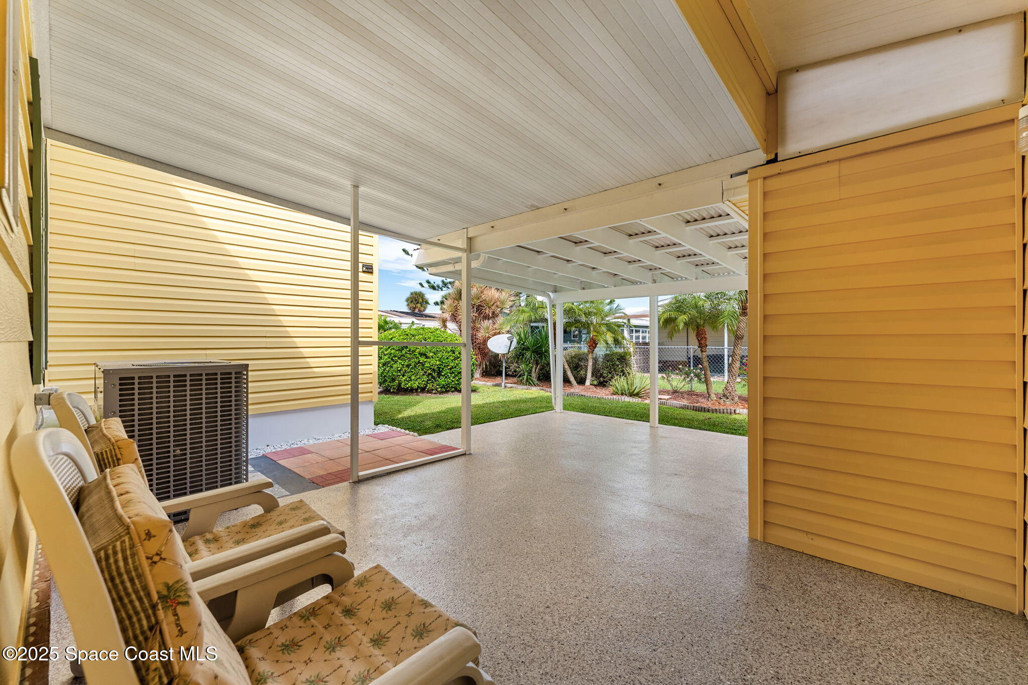 1885 Mango Street Northeast Palm Bay, FL 32905 - Photo 21 of 36 a view of backyard with seating space