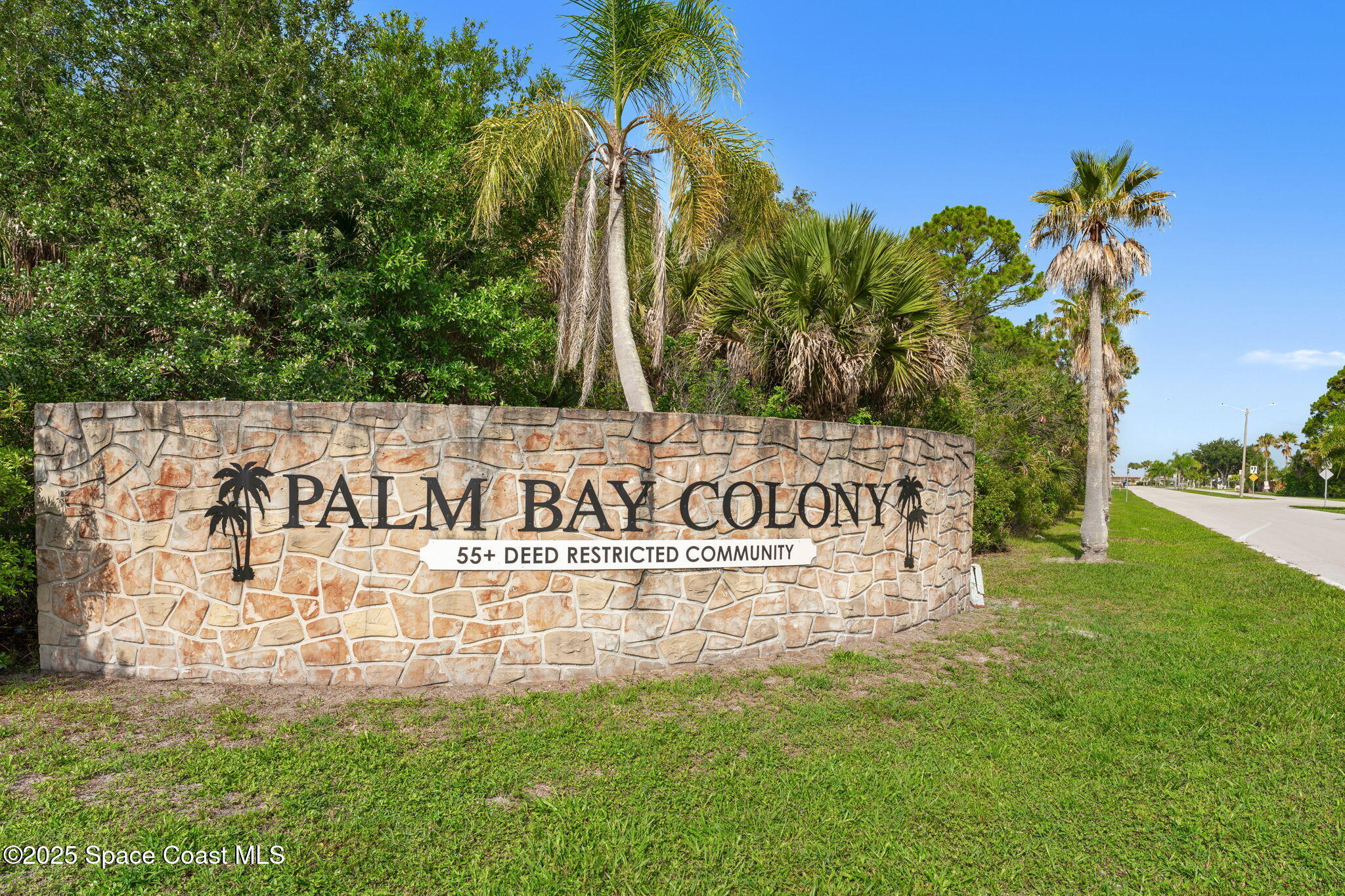 1885 Mango Street Northeast Palm Bay, FL 32905 - Photo 35 of 36 a sign on the side of the road