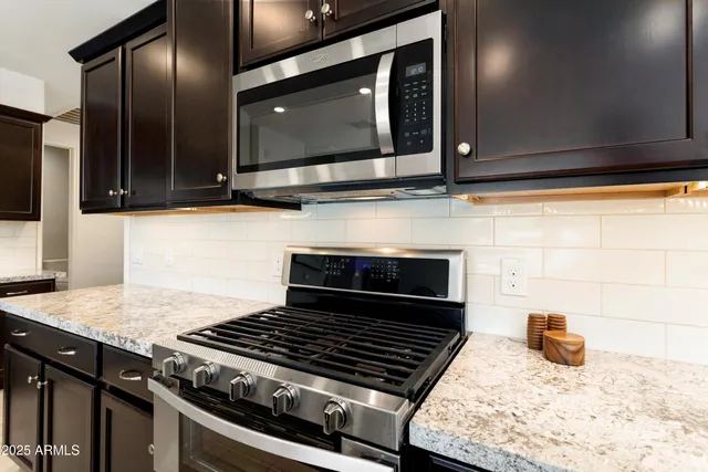 a bathroom with a double vanity sink a and a mirror