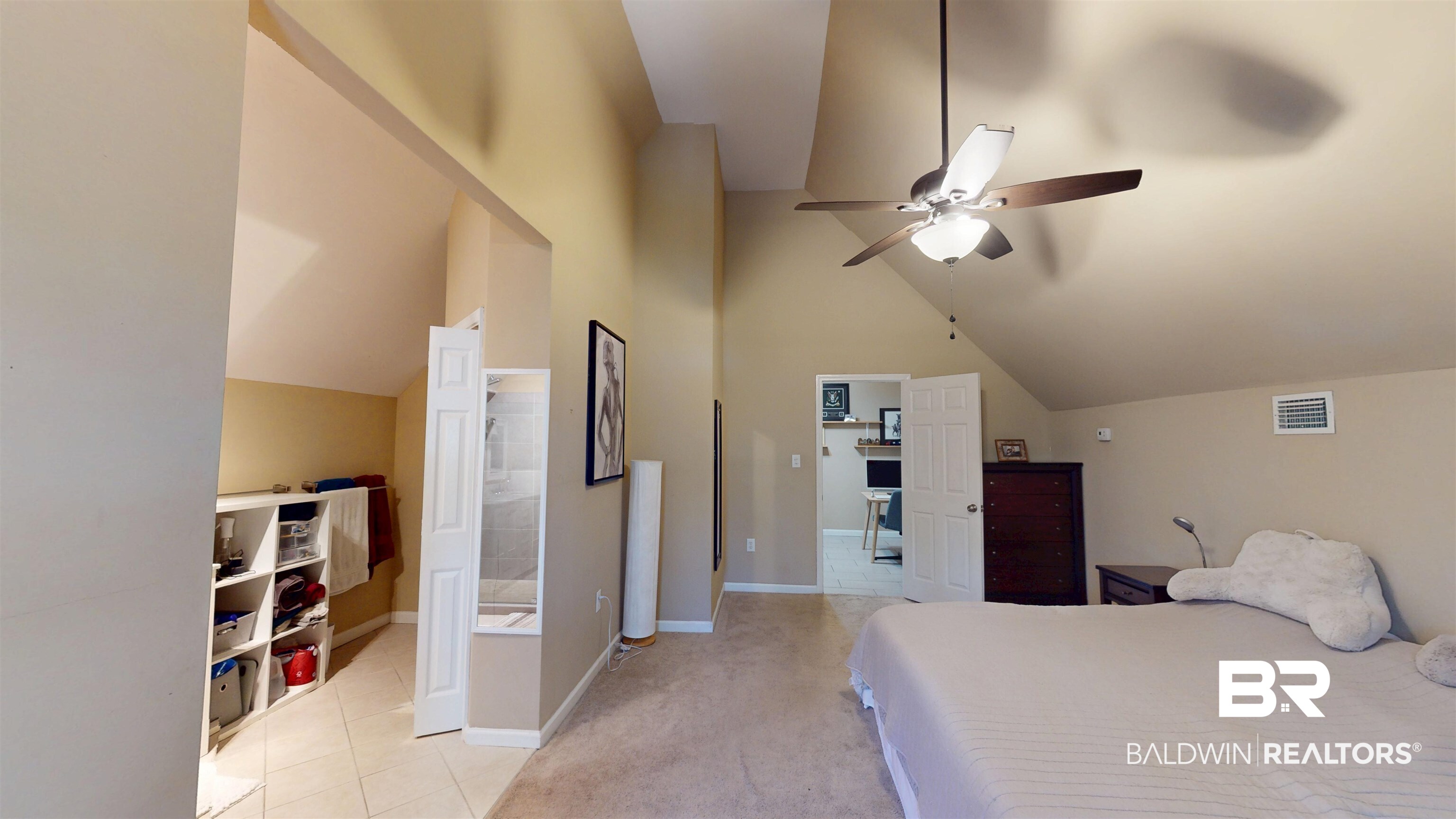1154 New St Francis Street Mobile, AL 36604 - Photo 33 of 37 Bedroom featuring visible vents, baseboards, light colored carpet, vaulted ceiling, and light tile patterned floors