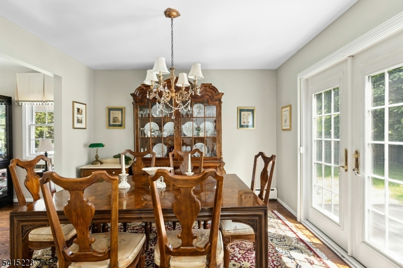 33 Carol Road Westfield, NJ 07090 - Photo 9 of 23 a view of a dining room with furniture and chandelier
