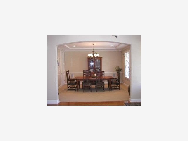 159 Cypress Point Road Half Moon Bay, CA 94019 - Photo 4 of 5 a view of a living room with furniture and a chandelier