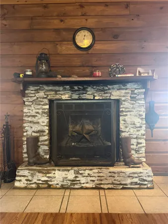 a stove top oven sitting inside of a kitchen