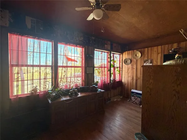 a view of workspace with wooden floor