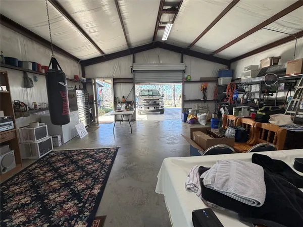a living room with lots of furniture and a flat screen tv