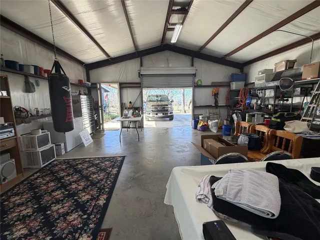 a living room with lots of furniture and a flat screen tv