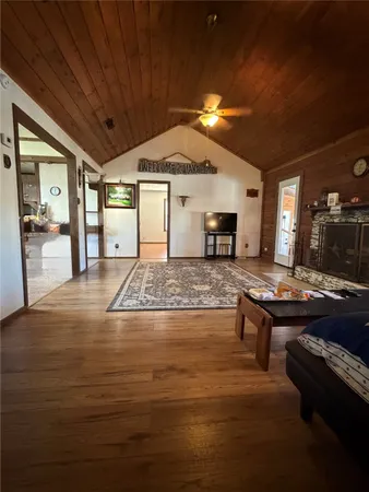 a living room with furniture and a table