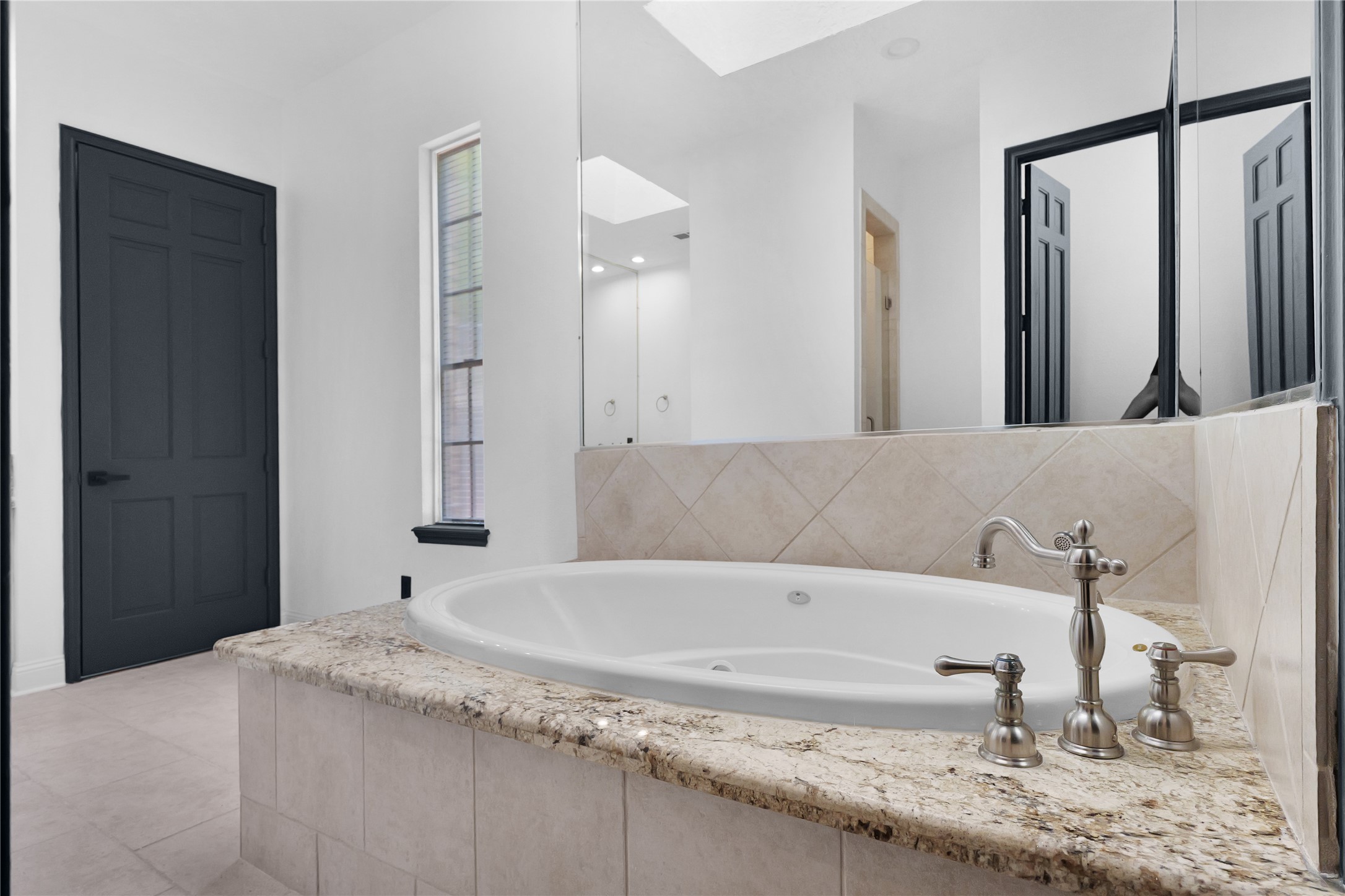 1425 Nantucket Drive, Unit D Houston, TX 77057 - Photo 7 of 12 Oversized jetted-tub, perfect for a bath after a long day